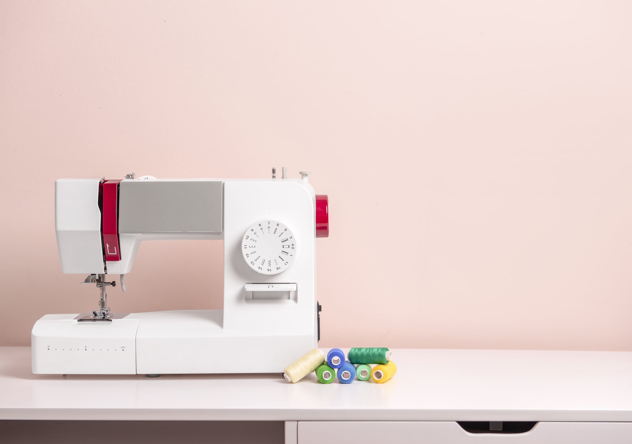 Sewing Machine with Supplies on Table